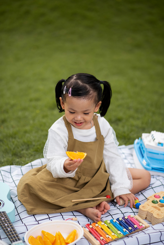 smiley-girl-sitting-cloth-full-shot